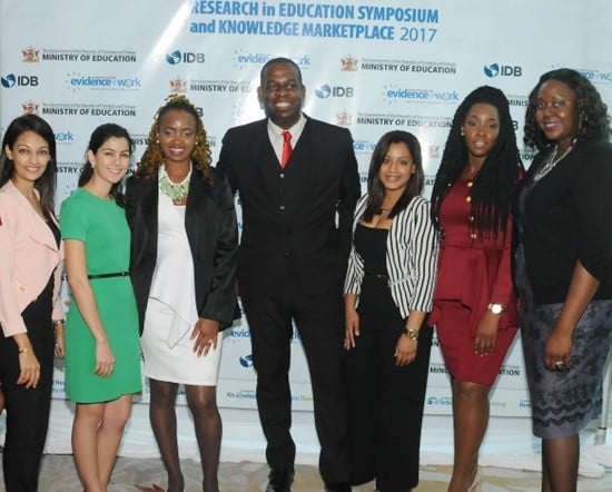 Ria Collingwood-Boafo is pictured with members of her team with Dr Lovell Francis, former Minister of State in the Ministry of Education 2015-2020.